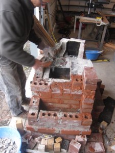 a horizontal throat in the roof, at the back