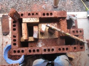 the rectangular firebox w/corner slot may be the reason it works the way it does...